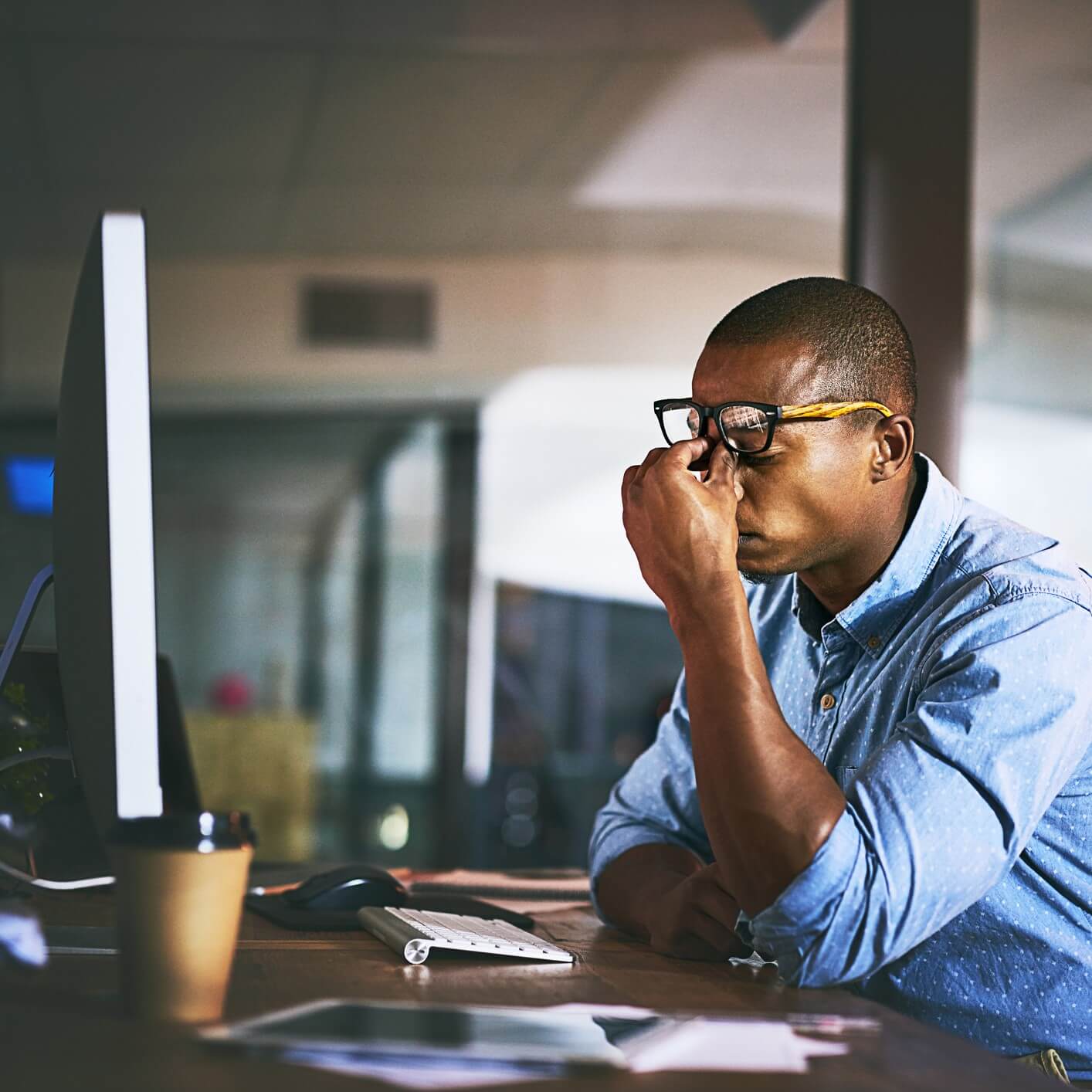 man stressed at work